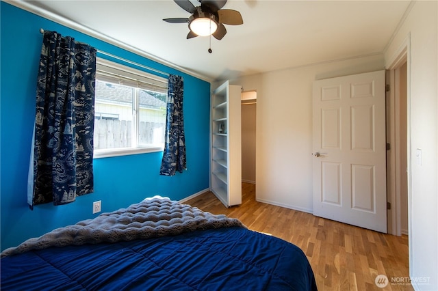 204 76th St SE, Everett, WA 98203 - bedroom with wood finished floors, baseboards, and ceiling fan