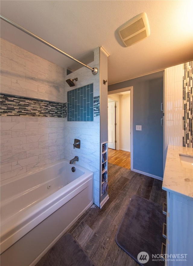 204 76th St SE, Everett, WA 98203 - full bathroom featuring shower / tub combination, wood finished floors, and vanity
