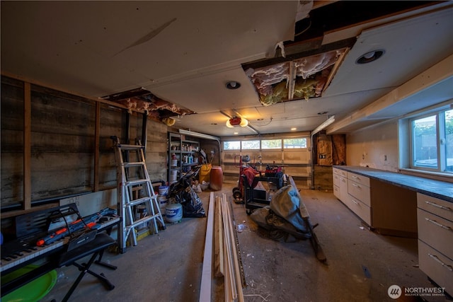 204 76th St SE, Everett, WA 98203 - garage with a workshop area and a garage door opener