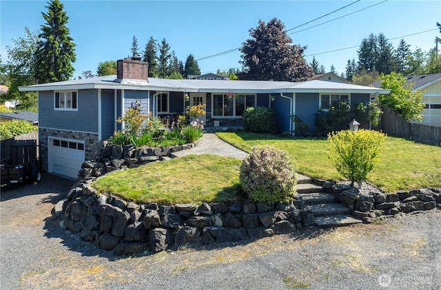 204 76th St SE, Everett, WA 98203 - ranch-style home featuring a chimney, an attached garage, and driveway