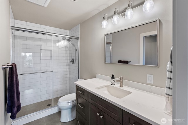 52 Chapman Loop Unit D, Steilacoom, WA 98388 - full bath with toilet, vanity, a shower stall, and tile patterned flooring