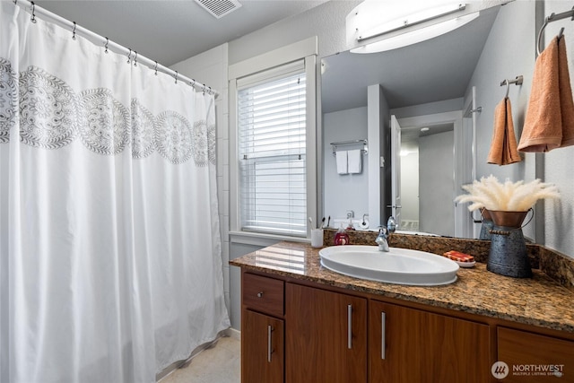 5822 N 35th St Unit C9, Tacoma, WA 98407 - full bathroom with vanity, tile patterned flooring, and curtained shower