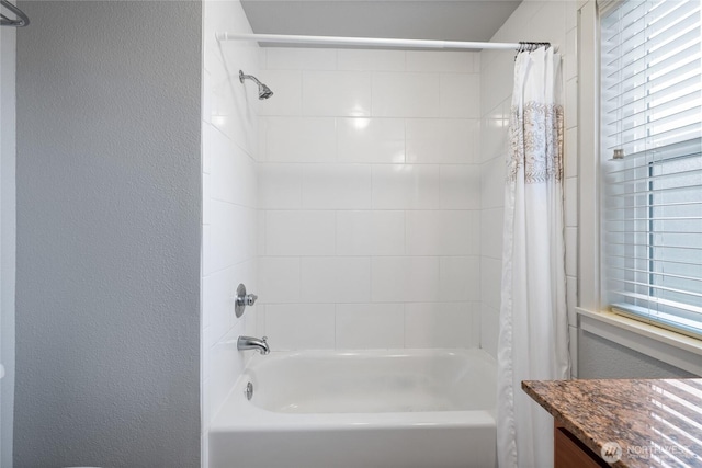 5822 N 35th St Unit C9, Tacoma, WA 98407 - full bathroom featuring shower / tub combo, a textured wall, plenty of natural light, and vanity