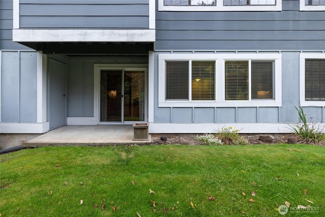 5822 N 35th St Unit C9, Tacoma, WA 98407 - view of exterior entry with a yard