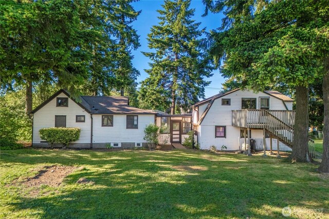 1416 S 88th St, Tacoma, WA 98444 - rear view of property with a yard, stairs, and a deck