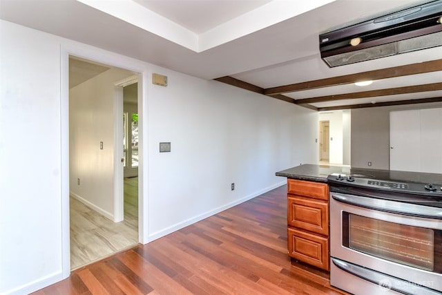 32622 39th Ave SW, Federal Way, WA 98023 - kitchen featuring stainless steel electric stove, dark wood-type flooring, brown cabinetry, baseboards, and beam ceiling