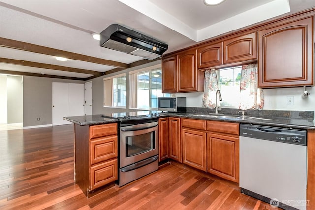 32622 39th Ave SW, Federal Way, WA 98023 - kitchen with stainless steel appliances, a sink, wall chimney exhaust hood, a peninsula, and dark stone countertops