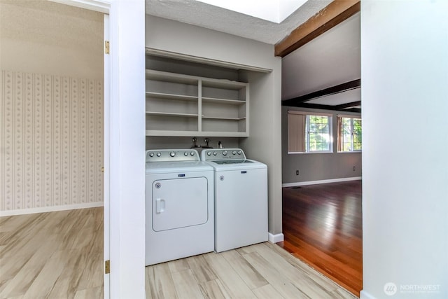 32622 39th Ave SW, Federal Way, WA 98023 - washroom with washer and clothes dryer, light wood-type flooring, and baseboards