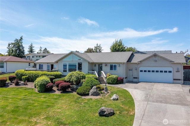 1257 Canterbury Ln, Oak Harbor, WA 98277 - single story home featuring an attached garage, a front yard, and concrete driveway
