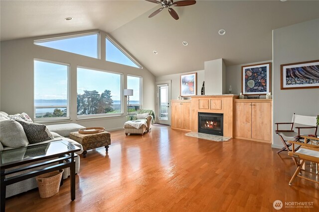 1257 Canterbury Ln, Oak Harbor, WA 98277 - living area featuring plenty of natural light, ceiling fan, lofted ceiling, and light wood-type flooring