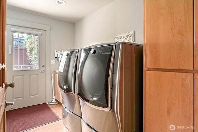 1257 Canterbury Ln, Oak Harbor, WA 98277 - washroom featuring light wood finished floors, washer and dryer, and recessed lighting