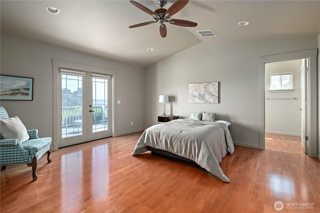 1257 Canterbury Ln, Oak Harbor, WA 98277 - bedroom featuring access to outside, lofted ceiling, french doors, baseboards, and light wood-style floors