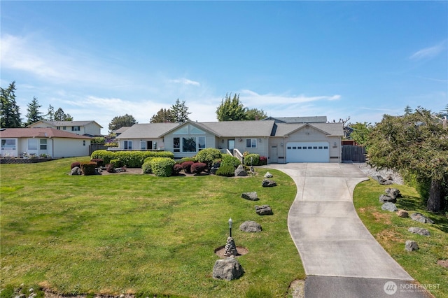 1257 Canterbury Ln, Oak Harbor, WA 98277 - single story home with driveway, an attached garage, and a front yard