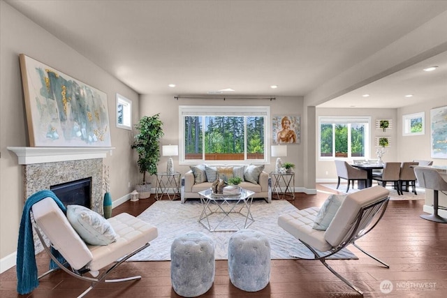17518 39th Ave SE, Bothell, WA 98012 - living room with hardwood / wood-style flooring, baseboards, recessed lighting, and a fireplace