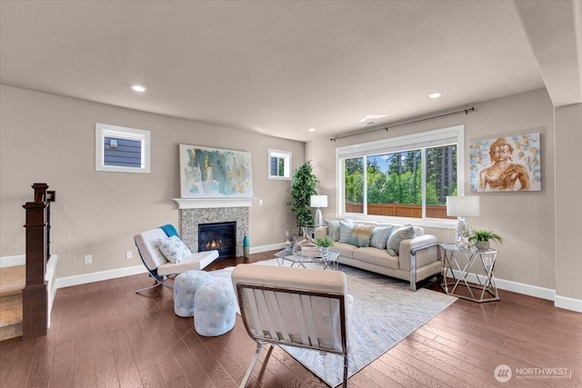 17518 39th Ave SE, Bothell, WA 98012 - living room with baseboards, a glass covered fireplace, hardwood / wood-style floors, and recessed lighting