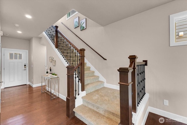 17518 39th Ave SE, Bothell, WA 98012 - staircase featuring baseboards, wood finished floors, and recessed lighting