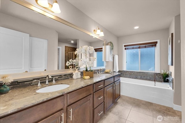 17518 39th Ave SE, Bothell, WA 98012 - bathroom with a bath, double vanity, tile patterned floors, a shower stall, and recessed lighting