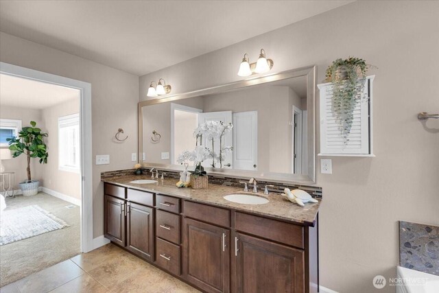17518 39th Ave SE, Bothell, WA 98012 - bathroom with double vanity, baseboards, and tile patterned flooring