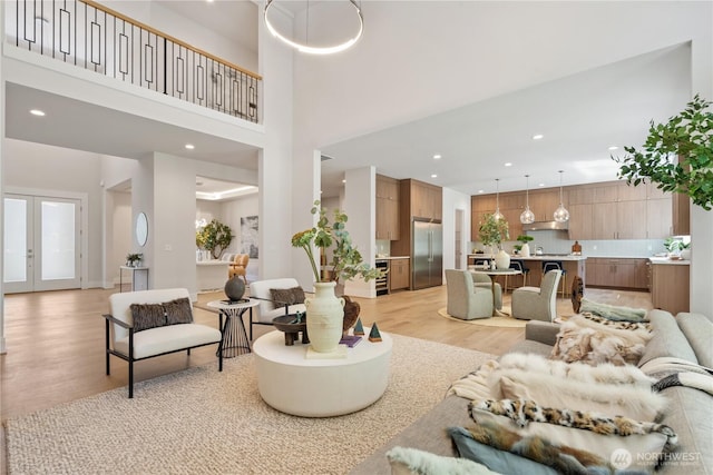 14511 SE 21st Pl, Bellevue, WA 98007 - living area featuring light wood-type flooring, recessed lighting, and a high ceiling