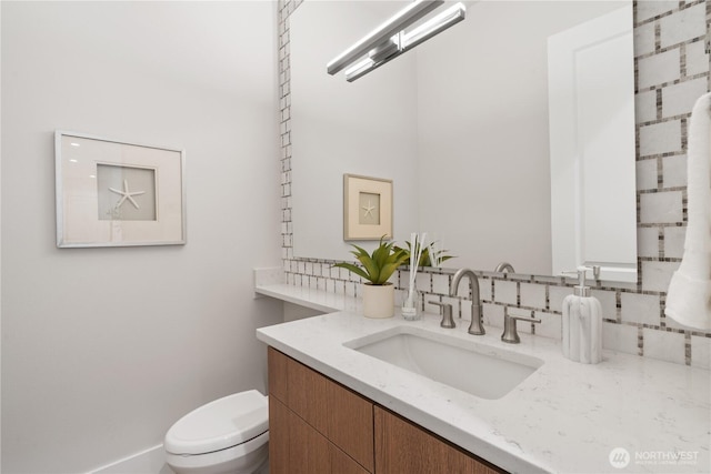 14511 SE 21st Pl, Bellevue, WA 98007 - bathroom featuring vanity, backsplash, and toilet