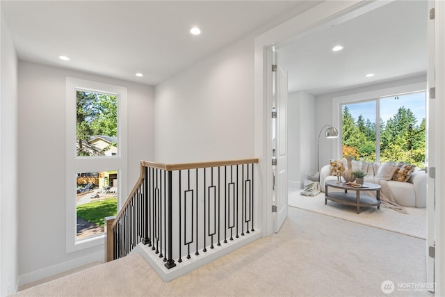 14511 SE 21st Pl, Bellevue, WA 98007 - hall with an upstairs landing, recessed lighting, plenty of natural light, carpet floors, and baseboards