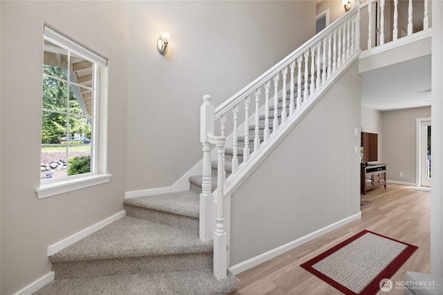 6579 Gleneagle Ave SW, Port Orchard, WA 98367 - stairway with baseboards and wood finished floors