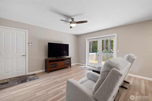 6579 Gleneagle Ave SW, Port Orchard, WA 98367 - living area with baseboards, ceiling fan, and light wood-type flooring