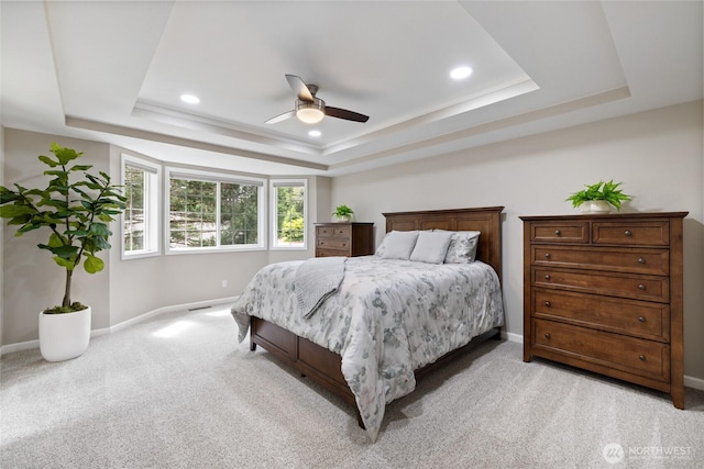 6579 Gleneagle Ave SW, Port Orchard, WA 98367 - bedroom featuring a tray ceiling, baseboards, light colored carpet, recessed lighting, and a ceiling fan