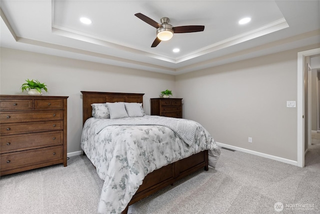 6579 Gleneagle Ave SW, Port Orchard, WA 98367 - bedroom featuring a tray ceiling, light carpet, recessed lighting, baseboards, and ceiling fan