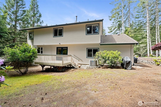 6579 Gleneagle Ave SW, Port Orchard, WA 98367 - back of house with a wooden deck and central AC unit