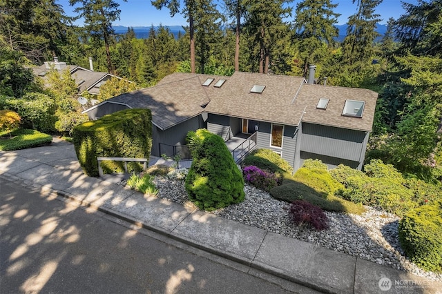 4906 157th Ave SE, Bellevue, WA 98006 - mid-century home featuring roof with shingles