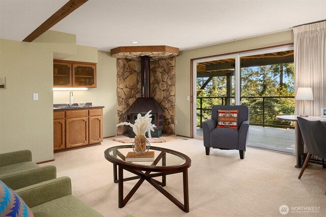 4906 157th Ave SE, Bellevue, WA 98006 - living area featuring light carpet, wet bar, and a wood stove