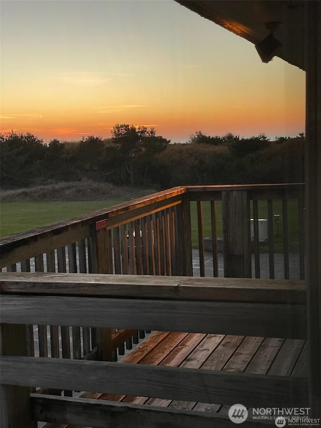 615 Ocean Shores Blvd NW Unit 303, Ocean Shores, WA 98569 - view of deck at dusk
