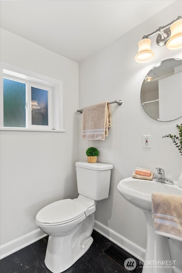 14817 Fremont Ave N, Shoreline, WA 98133 - half bath featuring baseboards, toilet, and tile patterned flooring