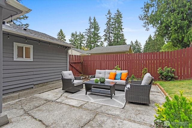 14817 Fremont Ave N, Shoreline, WA 98133 - fenced backyard with an outdoor living space and a patio