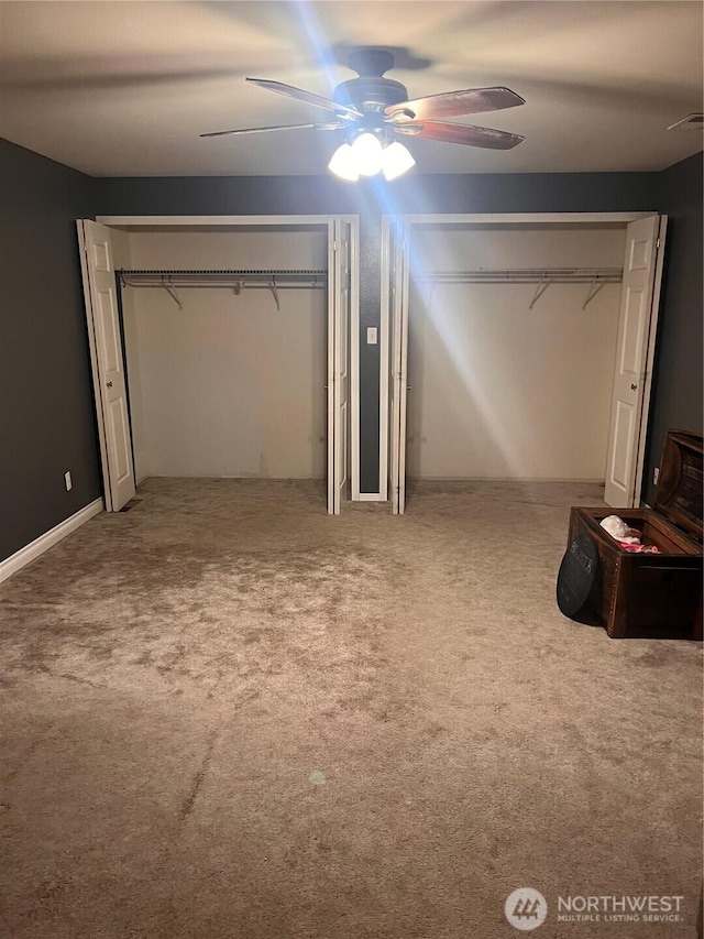 319 N Grape Dr, Moses Lake, WA 98837 - unfurnished bedroom featuring carpet flooring and ceiling fan