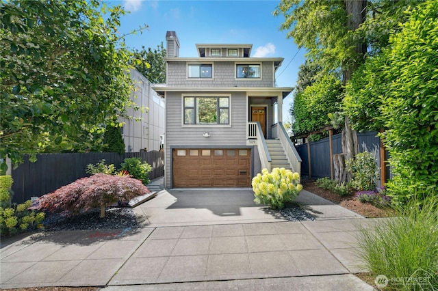 1109 30th Ave S, Seattle, WA 98144 - traditional style home with driveway, stairs, an attached garage, and a chimney