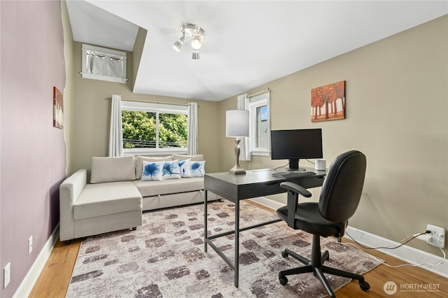 1109 30th Ave S, Seattle, WA 98144 - home office with baseboards, wood finished floors, and vaulted ceiling