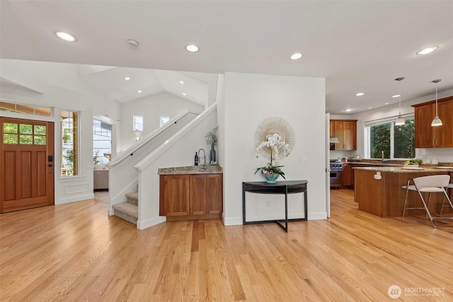 7301 NE 155th St, Kenmore, WA 98028 - foyer featuring light wood finished floors, recessed lighting, stairway, and vaulted ceiling