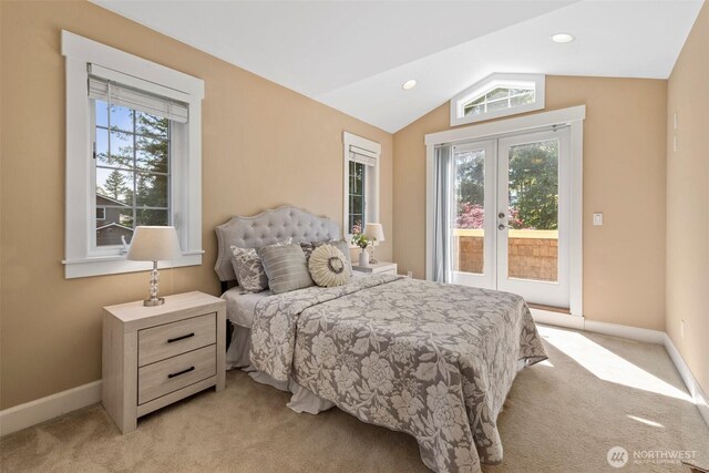 7301 NE 155th St, Kenmore, WA 98028 - bedroom featuring french doors, multiple windows, access to exterior, light carpet, and vaulted ceiling