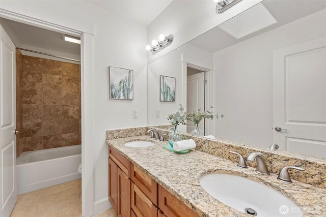 7301 NE 155th St, Kenmore, WA 98028 - full bathroom featuring double vanity, tile patterned flooring, toilet, and tub / shower combination