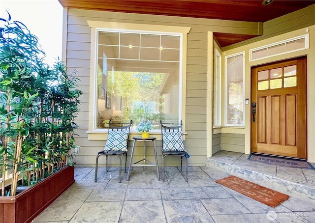 7301 NE 155th St, Kenmore, WA 98028 - view of exterior entry featuring a porch