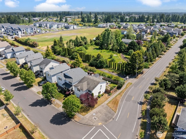 10096 Terra Glenn St SE, Yelm, WA 98597 - aerial view of residential area featuring a tree filled landscape