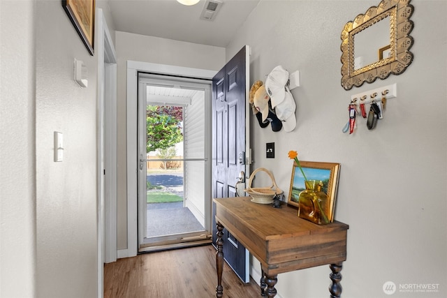10096 Terra Glenn St SE, Yelm, WA 98597 - doorway featuring wood finished floors