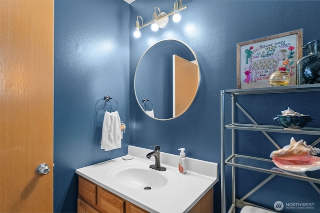 10096 Terra Glenn St SE, Yelm, WA 98597 - bathroom with vanity and a textured wall