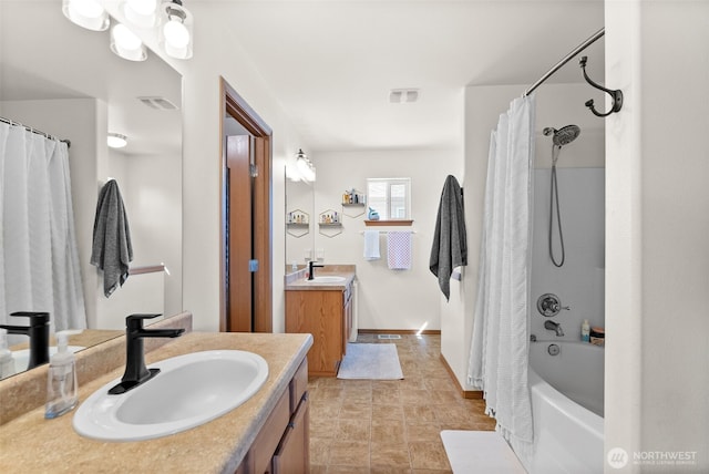 10096 Terra Glenn St SE, Yelm, WA 98597 - bathroom featuring vanity, shower / tub combo with curtain, and baseboards
