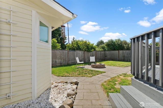 10096 Terra Glenn St SE, Yelm, WA 98597 - view of yard featuring a fire pit and a patio area