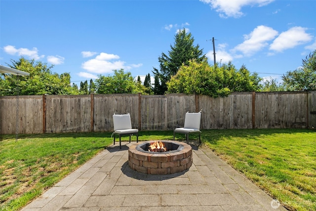 10096 Terra Glenn St SE, Yelm, WA 98597 - view of patio / terrace with an outdoor fire pit