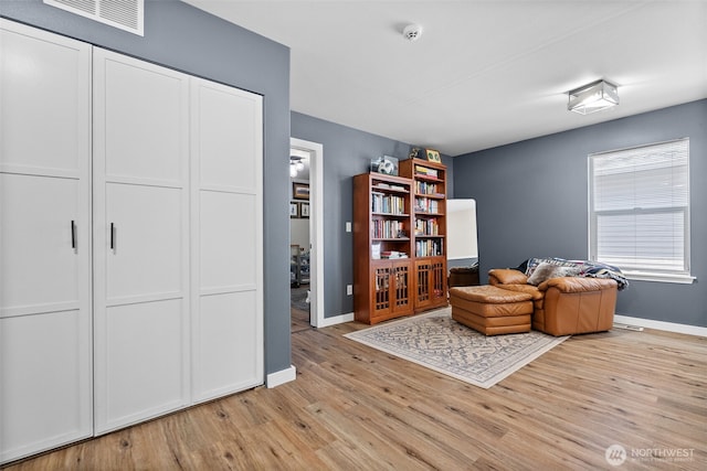 10096 Terra Glenn St SE, Yelm, WA 98597 - living area featuring light wood finished floors and baseboards