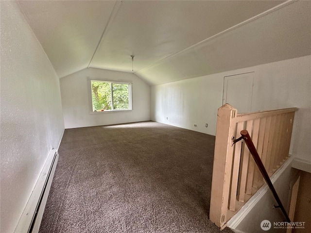 381 Trillium Ave, Forks, WA 98331 - additional living space with a baseboard heating unit, lofted ceiling, and carpet flooring